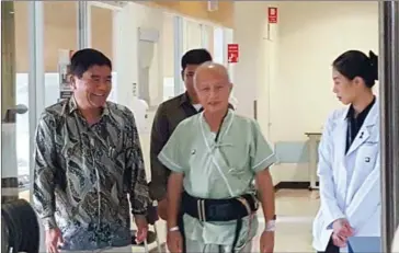  ?? SUPPLIED ?? Funcinpec party president Prince Norodom receives medical treatment at the Royal Phnom Penh Hospital following a tragic traffic accident in June last year that took the life of his wife.