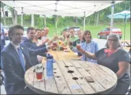  ?? LAUREN HALLIGAN - MEDIANEWS GROUP ?? A group of local leaders toast to Saratoga Race Course’s 2020 Opening Day during a watch party at Racing City Brewing Company in Saratoga Springs.