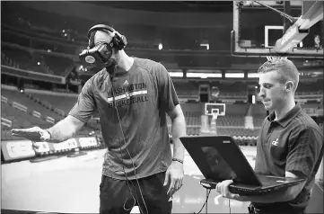  ??  ?? Washington Wizards centre with VR glasses in November 2015. The Washington Wizards, Capitals and Mystics are using virtual reality as a training tool. — Photo by Katherine Frey for The Washington Post