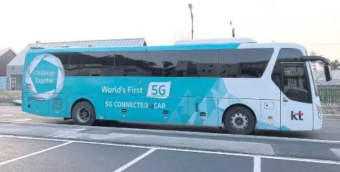  ??  ?? KT Corp’s self-driving ‘5G Bus’ is parked in Gangneung.