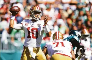  ?? Mitchell Leff / Getty Images ?? Jimmy Garoppolo and the offense took a bit to get started, then pulled off two long drives.