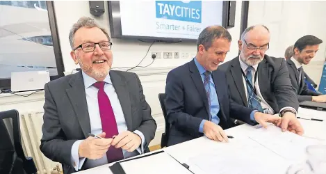  ?? Picture: Mhairi Edwards. ?? David Mundell MP with Michael Matheson MSP and Councillor Murray Lyle just after the deal was signed at Perth Civic Hall yesterday.