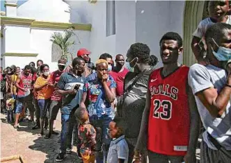  ?? EFE ?? Migrantes haitianos protestaro­n ayer en México, para que se les permita salir hacia América del Norte.