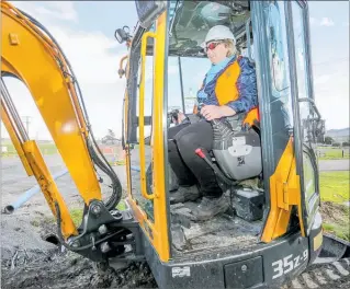  ?? PHOTO: WARREN BUCKLAND ?? CHB mayor Akex Walker behind the controls of a digger at last week’s launch of the “#thebigwate­rstory” in Otane.