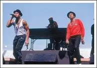  ?? Democrat-Gazette file photo ?? Run-DMC covered Aerosmith’s “Walk This Way” with the band’s Joe Perry and Steven Tyler.