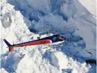  ??  ?? scenic helicopter flight over glaciers.