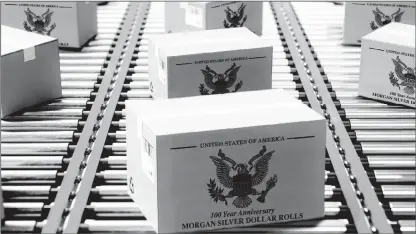  ?? ?? FLYING OUT THE DOOR: Calls are pouring in from state residents who are trying to get their hands on the last 100 year Anniversar­y State Restricted Morgan Silver Dollar Bank Rolls known to exist sealed away in the packages pictured above before the deadline ends. That’s because residents who beat the 2-day deadline printed in today’s publicatio­n are cashing in on the lowest ever state minimum price set by the National Mint and Treasury just by calling 1-800-233-9546 beginning at 8:30a.m. this morning.