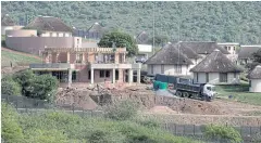  ??  ?? LEGAL BATTLE: Constructi­on continues on the private home of South African president Jacob Zuma in Nkandla.