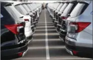  ?? DAVID ZALUBOWSKI - THE ASSOCIATED PRESS ?? In this Wednesday, Nov. 28, 2018, photograph, a long lines of unsold 2019 Pilot sports-utility vehicles sit at a Honda dealership in Highlands Ranch, Colo. Emotions run high when you’re buying a new or used car. So it’s easy to overlook details that could cost you in the long run.