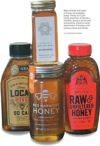  ?? THE ASSOCIATED PRESS ?? Many brands and types of honey are available today. Honey isn’t just honey anymore. At farmers markets, grocery stores and restaurant­s, there’s a wide assortment of honeys with various colors and tastes.