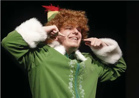  ?? PAUL CONNORS PHOTOS / BOSTON HERALD ?? Autistic Rutland teen Matt DiVito rehearses in costume as ‘Buddy the Elf’ for his starring role in Central Mass on Stage’s production.