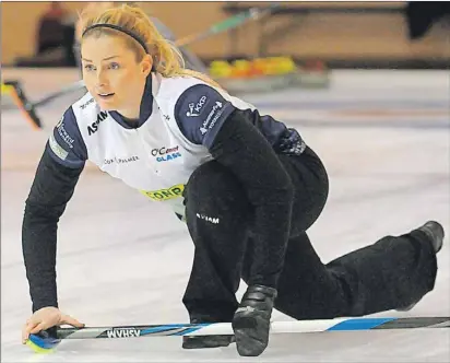  ?? JASON MALLOY/THE GUARDIAN ?? Meaghan Hughes watches a shot Sunday at the P.E.I. Scotties Tournament of Hearts in Montague.