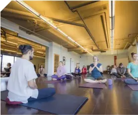  ??  ?? Langara offers a certificat­e program in therapeuti­c yoga for pain management.