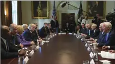  ?? AP PHOTO/SUSAN WALSH ?? President Donald Trump (center left), meets with members of the Senate Finance Committee and members of the President’s economic team in the Cabinet Room of the White House in Washington, Wednesday.