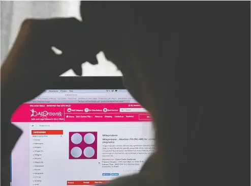  ?? OLIVIER DOULIERY / AFP VIA GETTY IMAGES ?? Privacy experts say that highly personal, cloud-based data could make women vulnerable because it could be used to surveil pregnancie­s and shared with police or sold to vigilantes.