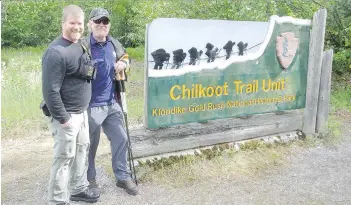  ?? TYLER MATHIESON ?? Ron Walsh, right, hiked the Chilkoot Trail with help from his friend Tyler Mathieson, left.