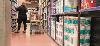  ?? George Frey/Bloomberg ?? Toilet paper awaits buyers at a grocery store in Salt Lake City. Prices are going up, thanks in part to the housing market slump, a lumber crisis and sawmill closings.