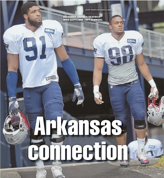  ?? STAFF PHOTO BY NANCY LANE ?? DEFENSIVE LINEMEN DEATRICH WISE (LEFT) AND TREY FLOWERS.