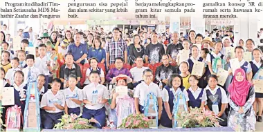  ??  ?? KITAR SEMULA: Murid dan guru dari SK Siburan Batu bersama tetamu lain merakam kenangan pada program kitar semula di sekolah itu, baru-baru ini.