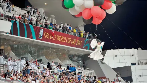  ?? KT photos by Nezar Balout ?? Performers during the closing ceremony of the Fifa U-17 World Cup at the Mohammed bin Zayed Stadium on Friday evening. —