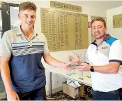  ?? ?? After losing the club championsh­ip in a sudden death play-off Lachie Bambridge (left) received some consolatio­n when club captain Glenn Robinson presented the junior championsh­ip and A grade 54-hole handicap.