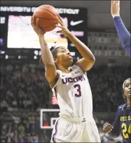  ?? Jessica Hill / Associated Press ?? Megan Walker and UConn are back in the top spot of the latest AP Top 25 poll.