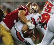  ?? NHAT V. MEYER — BAY AREA NEWS GROUP ?? The 49ers’ Nick Bosa forces a fumble against the Browns’ Baker Mayfield in the fourth quarter on Oct. 7.