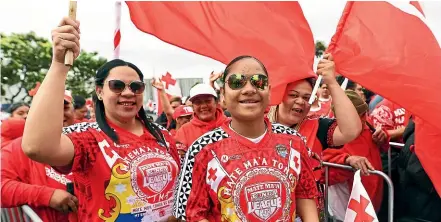  ?? PHOTOSPORT ?? Tonga’s supporters are out in force backing their team for the historic test match against the Kangaroos tomorrow in Auckland.