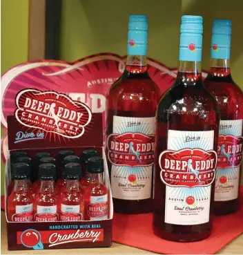  ?? WAYNE NEWTON ?? Cranberry vodka is one of a plethora of berry-themed products at Rubi Reds.