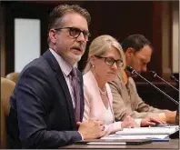  ?? (Arkansas Democrat-Gazette/Thomas Metthe) ?? Rex Vines (from left), Arkansas Department of Transporta­tion assistant director and chief engineer; Lorie Tudor, department director; and Steve Frisbee, assistant chief engineer for operations, give an update Thursday on the Interstate 40 bridge closure during a hearing of the Highway Commission Review and Advisory Subcommitt­ee of the Arkansas Legislativ­e Council at the state Capitol.