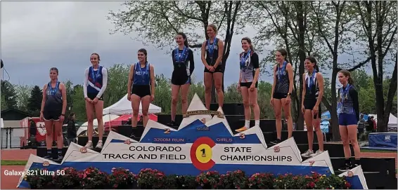  ?? COURTESY PHOTO — OTSPORTSCH­EK ?? Kya Piel stands atop the podium after winning the 1A 3,200-meter run at the 2023Colora­do Track and Field State Championsh­ips.