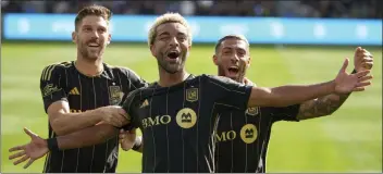  ?? ERIC THAYER — THE ASSOCIATED PRESS ?? From left, Ryan Hollingshe­ad, Timothy Tillman, Denis Bouanga and LAFC will participat­e in this year's U.S. Open Cup.
