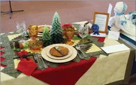  ?? RICHARD SMITH VIA AP ?? This photo provided by Richard Smith shows Andrea Smith's award winning tablescape which depicts the contest theme of "High Country Celebratio­ns," and is titled "Flatlander's Welcome - A Taste of the Mountains," at the Creative Colorado Table Setting...
