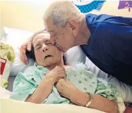  ?? CINDI PERANTONI RODGERS/COURTESY ?? Miguel Antonio Franco kisses his wife Cecilia Franco during a visit in December 2016 while she was living at the Rehabilita­tion Center at Hollywood Hills. Cecilia Franco died nearly a month after her husband died at the overheated center, according to...