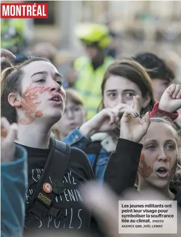  ?? PHOTO AGENCE QMI, JOËL LEMAY ?? Les jeunes militants ont peint leur visage pour symboliser la souffrance liée au climat.