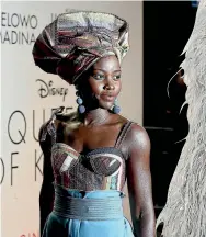  ?? GETTY IMAGES ?? 17-year-old Adut Akech, right, has already caught the eye of actress Lupita Ngong’o, above, who told the teen model to ‘‘get in touch with her’’ in New York.