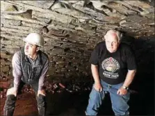  ?? SUBMITTED PHOTO ?? Above, interim Borough Manager Justin Keller, left, gives state Rep. Tim Hennessey a tour of the stormwater arch near the portion that collapsed behind Walnut Street in May.