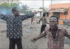  ??  ?? Smokescree­n: Anti-government protests in Togo were cited as the reason for cancelling the Africa-Israel Summit. Photo: Pius Utomi Ekpei/ AFP