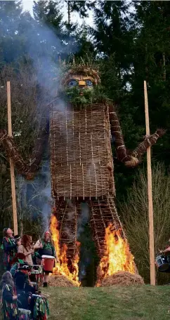  ??  ?? TOP LEFT: The Green Man and the May Queen. ABOVE LEFT: The Pentacle Drummers bring the beat. ABOVE: The wicker man is put to the torch. TOP RIGHT: The blazing giant