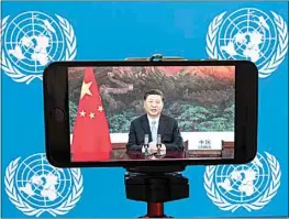  ?? MARY ALTAFFER / AP ?? Chinese President Xi Jinping is seen on a video screen remotely addressing the 75th session of the United Nations General Assembly on Tuesday at U.N. headquarte­rs.