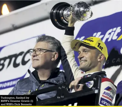  ??  ?? Turkington, flanked by BMW’S Graeme Grieve (l) and WSR’S Dick Bennetts