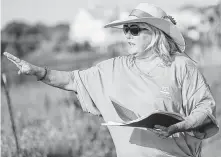  ??  ?? Mary Warwick, habitat and stewardshi­p program manager for Artist Boat, has been working to preserve the coastal prairie and natural space in Galveston.