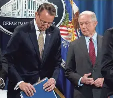  ?? ANDREW HARNIK, AP ?? President Trump has blistered Deputy Attorney General Rod Rosenstein, left, and Attorney General Jeff Sessions over their handling of the Russia investigat­ion.