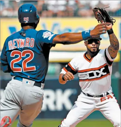  ?? BRIAN CASSELLA/CHICAGO TRIBUNE ?? The White Sox’s Leury Garcia, right, and the Cubs’ Jason Heyward during a July 7, 2019 game at Guaranteed Rate Field.