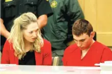  ?? MIKE STOCKER/SOUTH FLORIDA SUN-SENTINEL VIA AP, POOL ?? Nikolas Cruz appears in court for a status hearing before Broward Circuit Judge Elizabeth Scherer in Fort Lauderdale, Fla., on Monday. Cruz is charged with killing 17 people and wounding many others in Wednesday's attack at Marjory Stoneman Douglas...