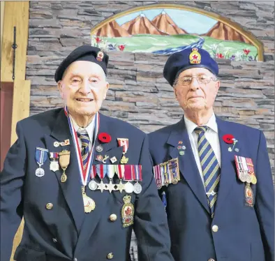  ?? GLEN WHIFFEN/THE TELEGRAM ?? Merchant Navy Second World War veteran Charles Moores (left) is 101 years of age. He is pictured with fellow Meadow Creek Retirement Centre resident Irving Wareham Friday morning prior to attending a Remembranc­e service being held at the retirement centre in Paradise.