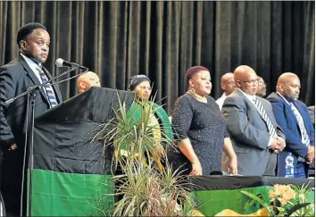  ?? Picture: EUGENE COETZEE ?? STRUGGLE HERO: Close friend Zola Yeye speaks at the memorial service of Duma Lamani yesterday. Also paying their respects are, in front from left, Ntombekhay­a Makhaza, Freddie Makoki and Mkhululi Magada