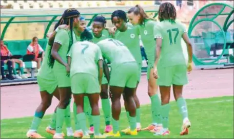  ?? ?? Super Falcons players celebratin­g after defeating Cameroon’s Indomitabl­e Lionesses 1–0 to advance to a final playoff with South Africa