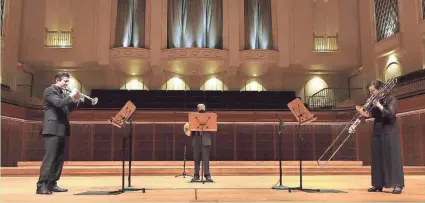  ?? SCREEN CAPTURE ?? Trumpeter Matthew Ernst, horn player Matthew Annin and trombonist Megumi Kanda perform during the Milwaukee Symphony’s season-opening concert.