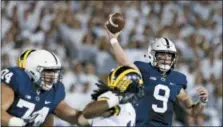  ?? CHRIS KNIGHT — THE ASSOCIATED PRESS FILE ?? In this file photo, Penn State quarterbac­k Trace McSorley (9) throws a pass against Michigan during the first half of an NCAA college football game in State College. McSorley is expected to start this week against Michigan after missing part of last week’s 30-24 win over No. 18 Iowa.